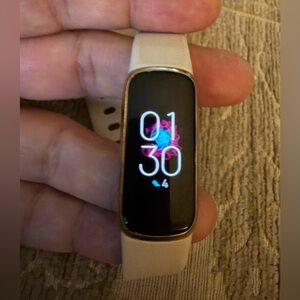 Fitbit Luxe Gold with Cream Band - Like New with charger.